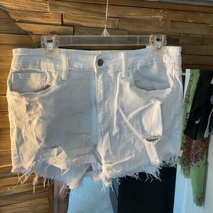 White distressed jean shorts